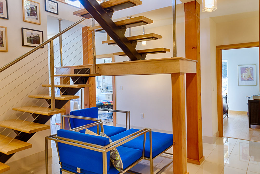 floating stairs lead into finished basement