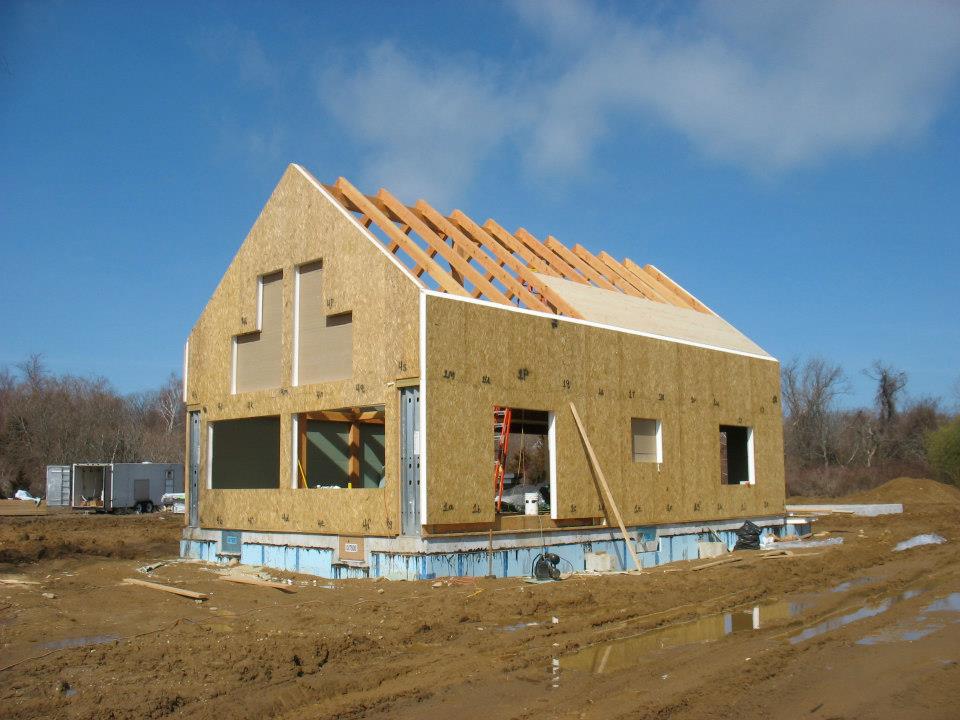 structural insulated panels with timber frame construction