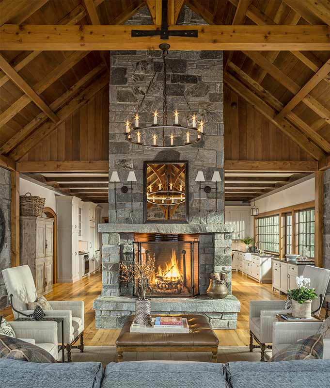 timber frame great room with stone fireplace