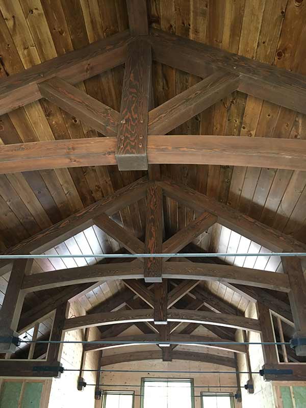 stained timber trusses