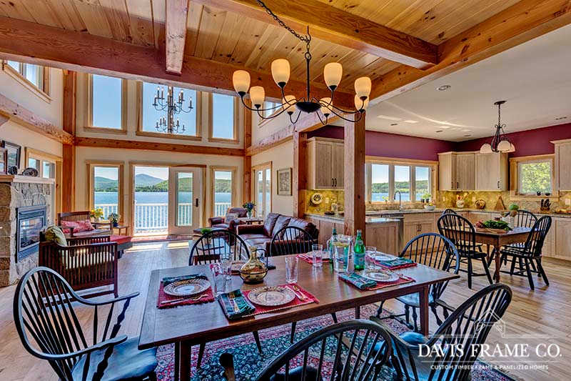 Timber frame open floor plan featuring kitchen, dining room, and great room. 