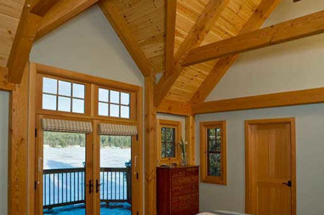 Lakeside timber frame bedroom 