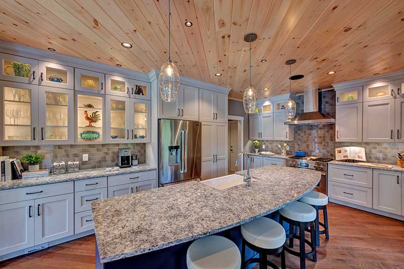 hybrid lakeside timber frame home with conventional kitchen 