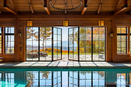 View of pool out through glass doors
